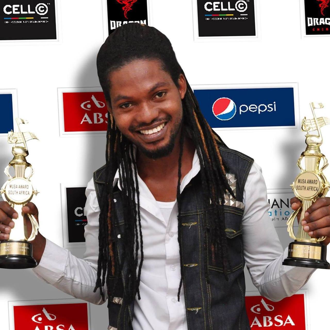 Sparqlyn smiling with trophies